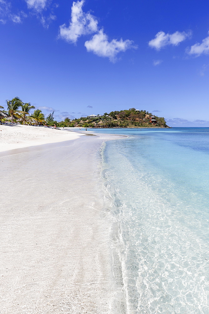 Palm trees and white sand surround the turquoise Caribbean sea, Ffryes Beach, Antigua, Antigua and Barbuda, Leeward Islands, West Indies, Caribbean, Central America