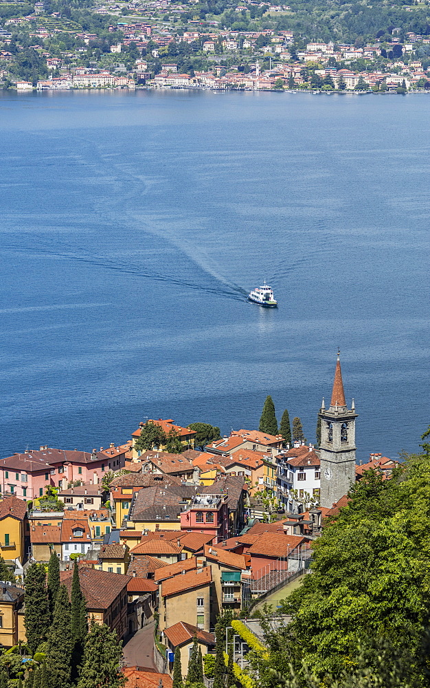 The typical village of Varenna surrounded by the blue water of Lake Como and gardens, Province of Lecco, Italian Lakes, Lombardy, Italy, Europe