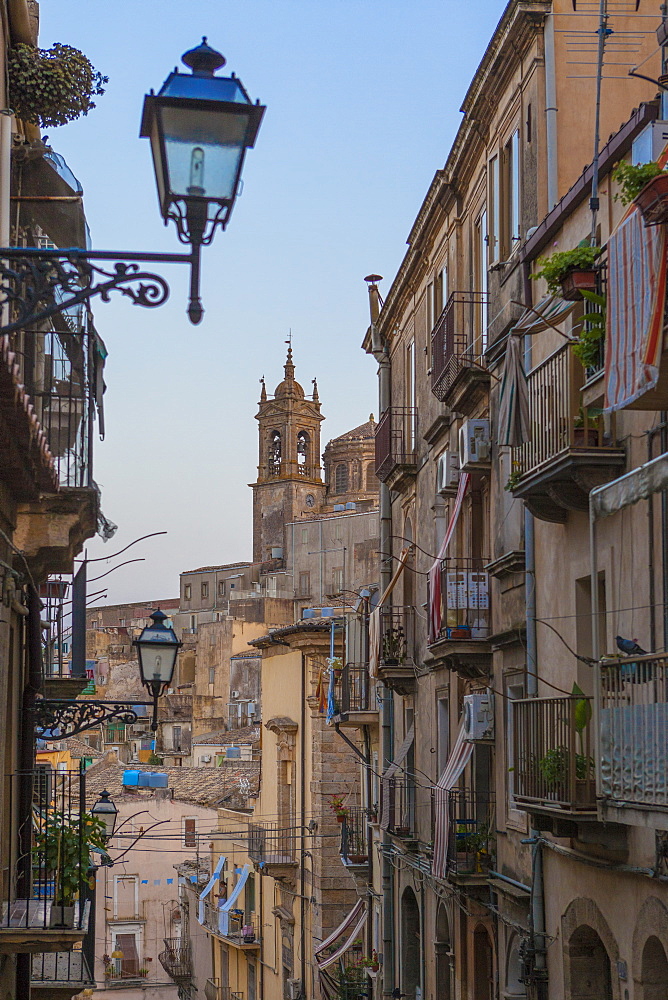 Street lanterns and houses in the typical alleys of the old town, Caltagirone, Province of Catania, Sicily, Italy, Europe