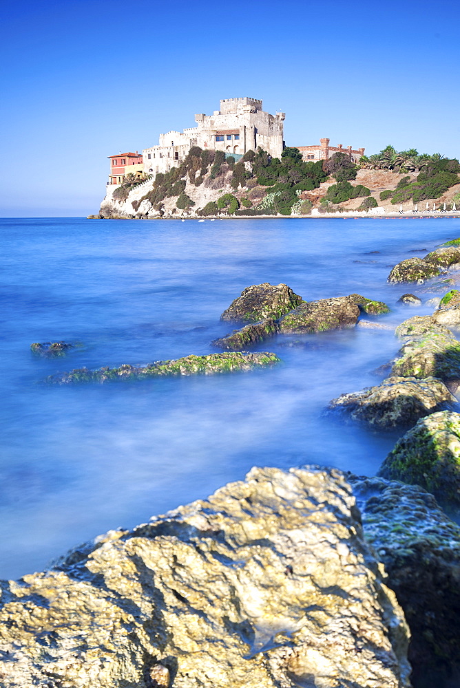 Sunrise on turquoise sea frames the medieval Falconara Castle, Butera, Province of Caltanissetta, Sicily, Italy, Mediterranean, Europe