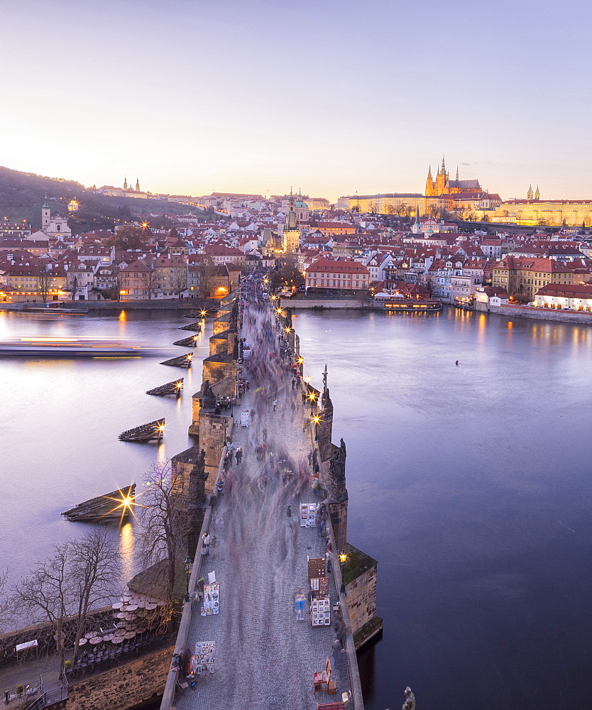 Vltava River and by Charles Bridge at sunset, UNESCO World Heritage Site, Prague, Czech Republic, Europe