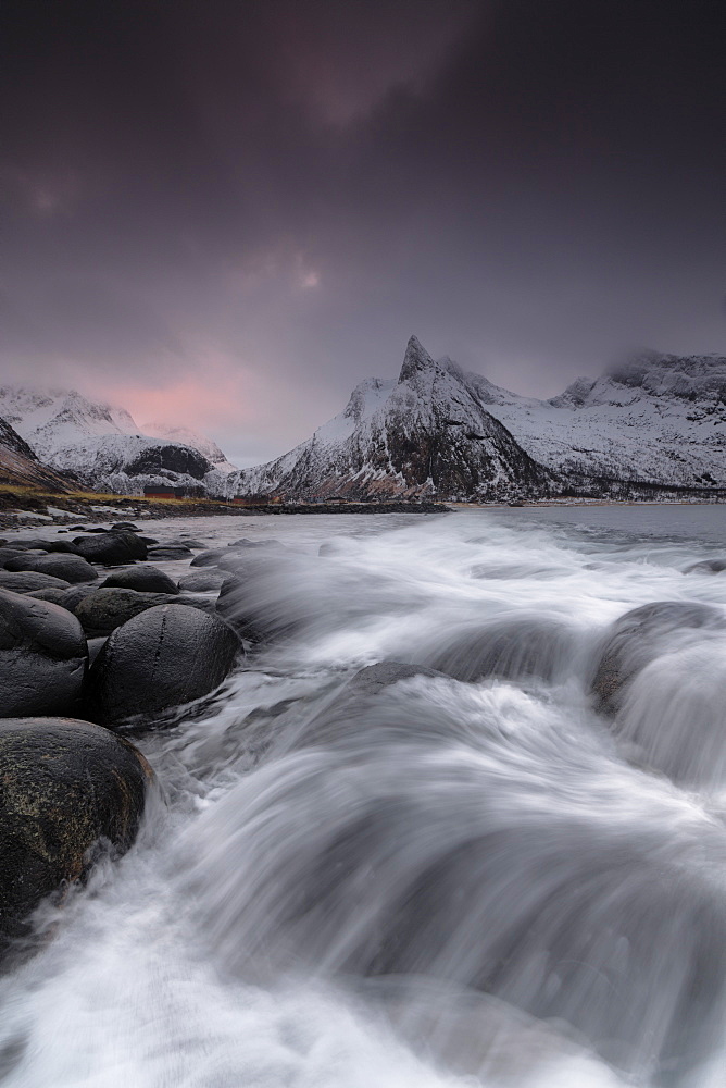 Dark clouds above snowy peaks and waves of the cold sea, Senja, Ersfjord, Troms county, Norway, Scandinavia, Europe