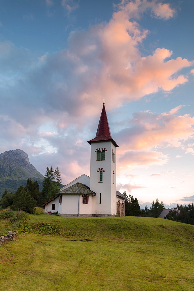 Clouds at sunset on Chiesa Bianca, Maloja, Bregaglia Valley, Engadine, Canton of Graubunden, Swiss Alps, Switzerland, Europe