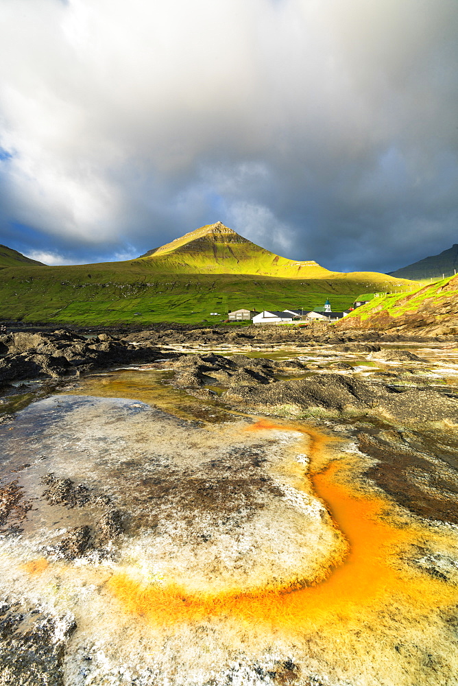 Rock formation in water, Gjogv, Eysturoy island, Faroe Islands, Denmark, Europe