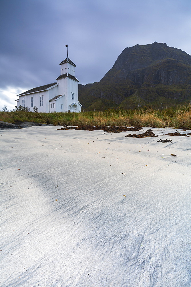 Church by beach on Gimsoya, Lofoten Islands, Norway, Europe