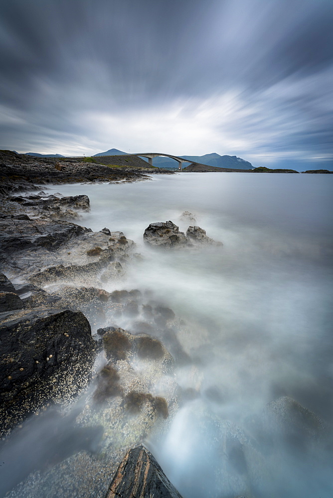 Storm clouds over Storseisundet Bridge along the Atlantic Road, More og Romsdal county, Norway, Scandinavia, Europe