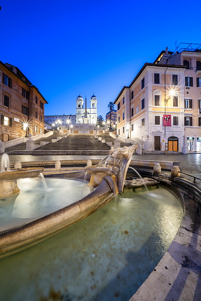 Piazza di Spagna (Spanish Steps), Barcaccia fountain and Trinita dei Monti at dusk, Rome, Lazio, Italy, Europe