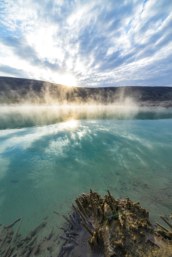 Hot water and steam spraying out of Ala Lobet (Alol Bet) geyser, Semera, Afar Region, Ethiopia, Africa