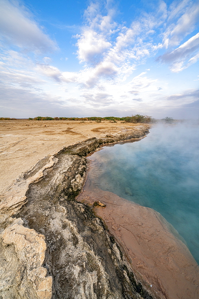 Steam rising from the hot water of Ala Lobet (Alol Bet) geyser, Semera, Afar Region, Ethiopia, Africa