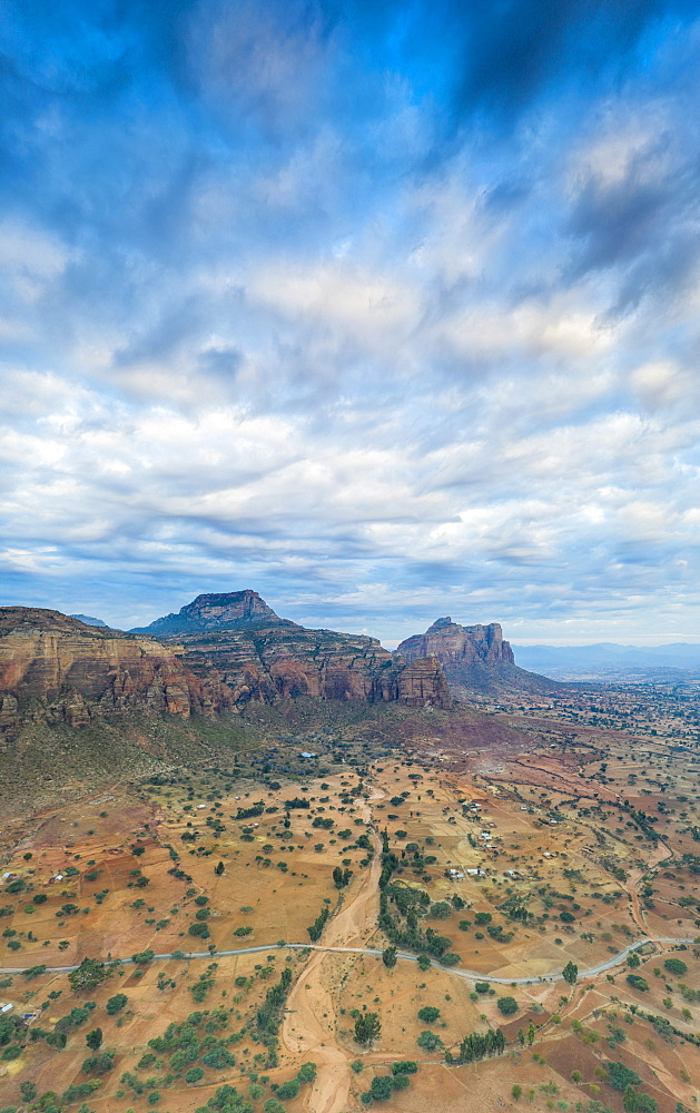 Aerial panoramic by drone of clouds at sunset over Gheralta Mountains, Hawzen, Tigray Region, Ethiopia, Africa