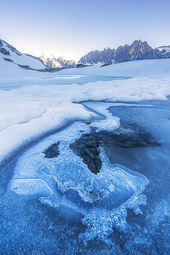 Icy surface of Forbici Lake due to spring thaw, Valmalenco, Valtellina, Sondrio province, Lombardy, Italy, Europe