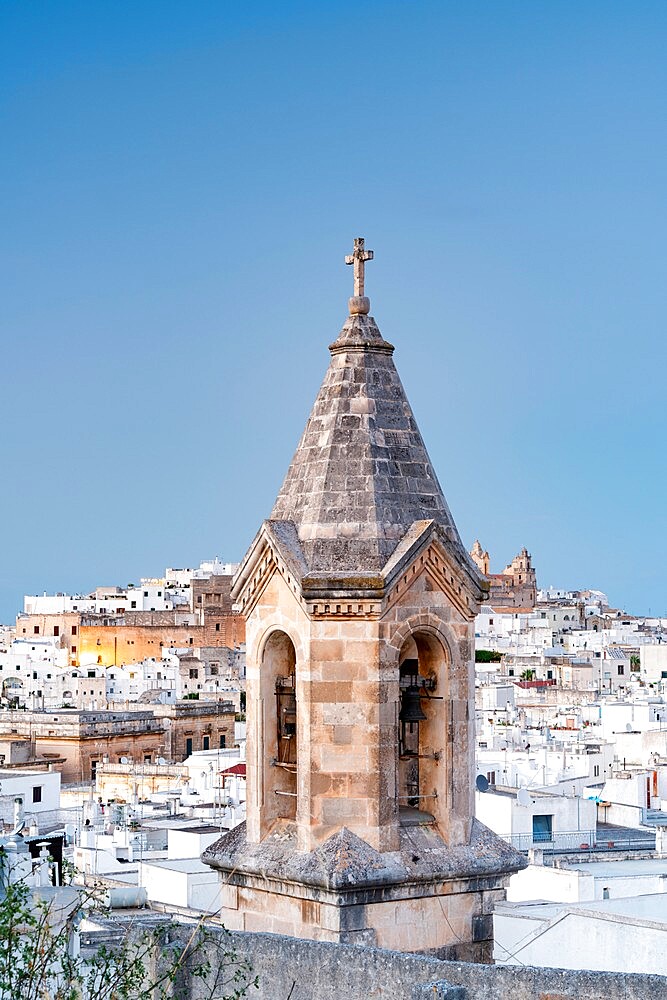 Medieval bell tower and whitewashed houses in the old town of Ostuni, province of Brindisi, Salento, Apulia, Italy, Europe