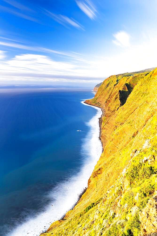 Majestic cliffs of Ponta Do Pargo and ocean at sunset, Calheta, Madeira island, Portugal, Atlantic, Europe