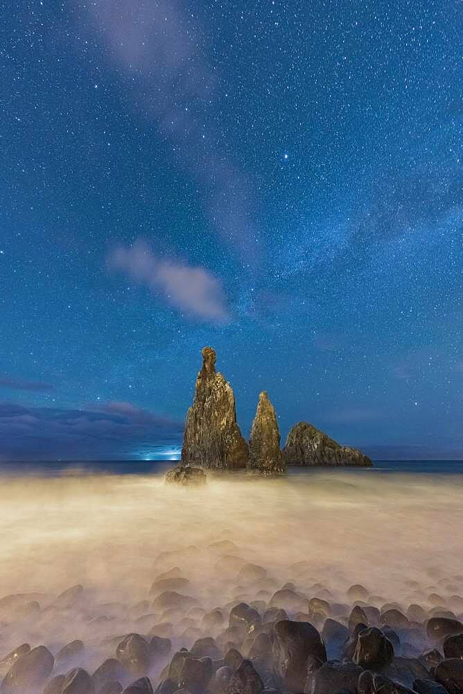 Waves crashing over Ilheus da Rib and Ribeira da Janela rock formations under the starry night sky, Madeira, Portugal, Atlantic, Europe