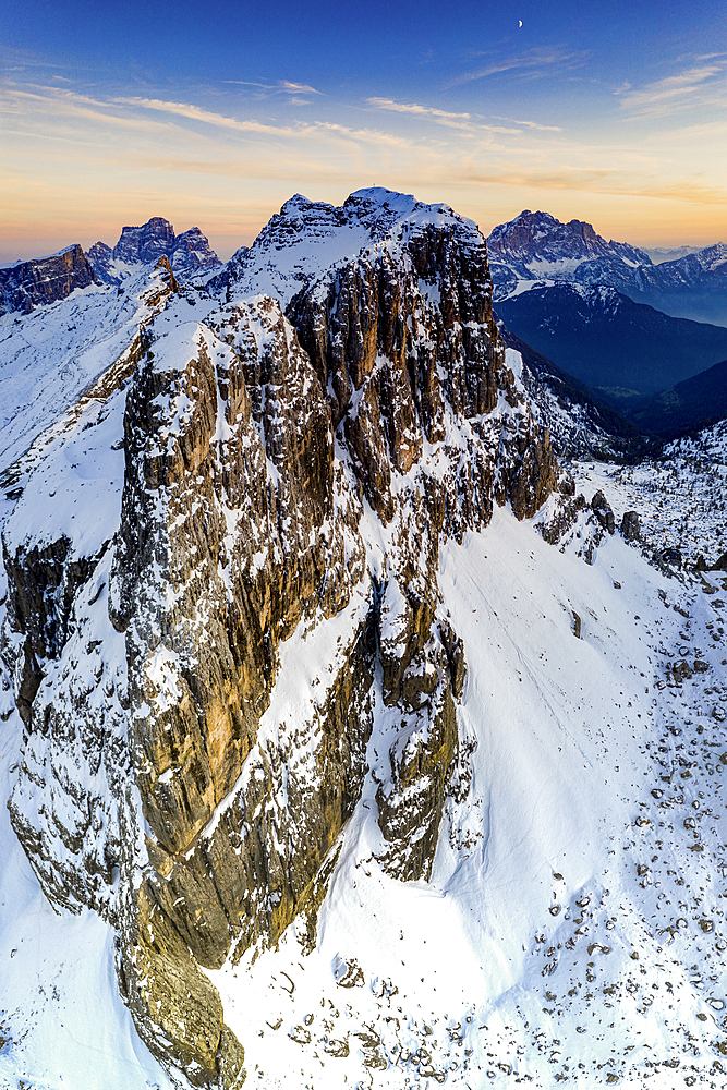 Aerial panoramic of majestic Nuvolau, Monte Pelmo and Civetta covered with snow at sunset, Dolomites, Veneto, Italy, Europe