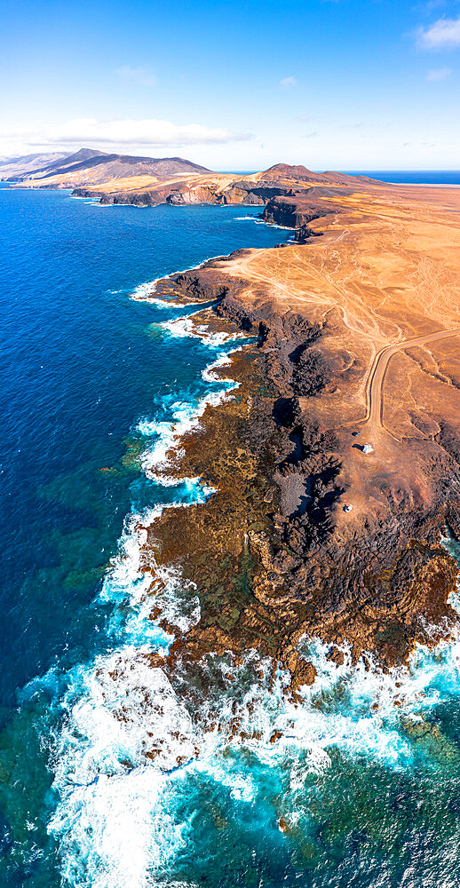 Aerial view of Punta Pesebre and Rabo de Raton volcanic cliffs washed by waves, Jandia, Fuerteventura, Canary Islands, Spain, Atlantic, Europe