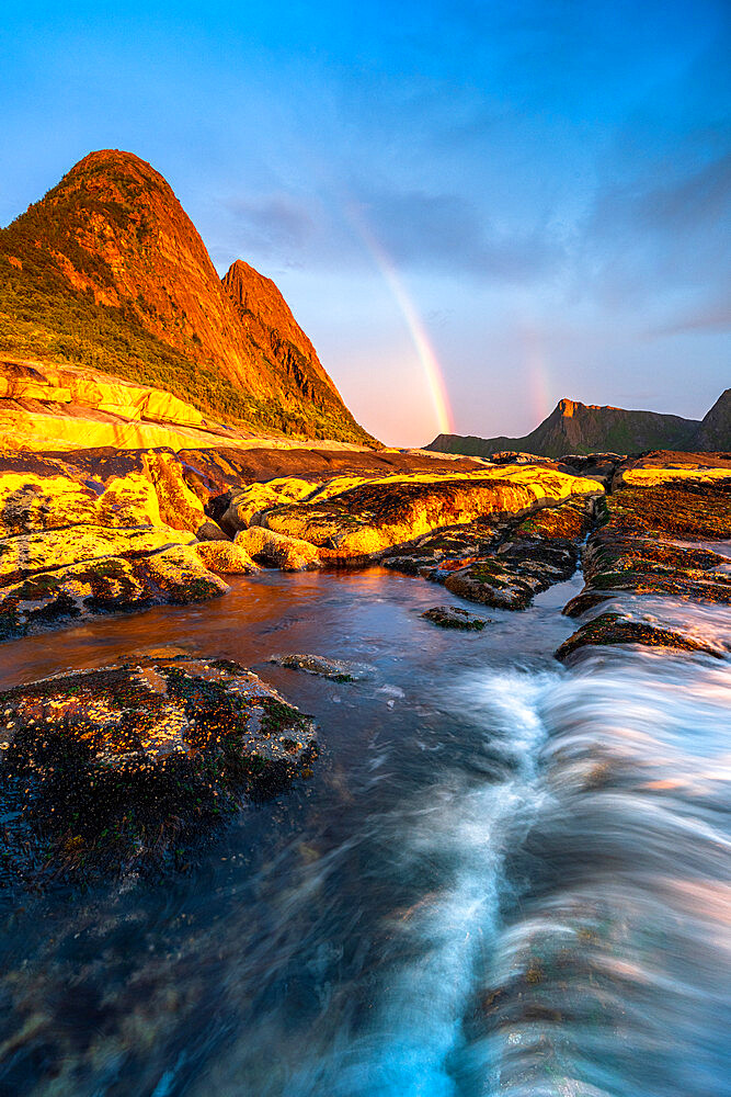 Rainbow over mountains and Arctic sea from Tungeneset viewpoint, Senja, Troms county, Norway, Scandinavia, Europe