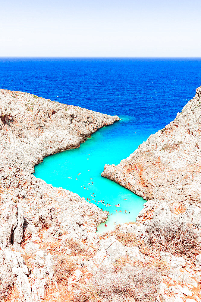 Beach of Seitan Limania washed by turquoise sea nestled inside rock canyons, Akrotiri peninsula, Chania, Crete, Greek Islands, Greece, Europe