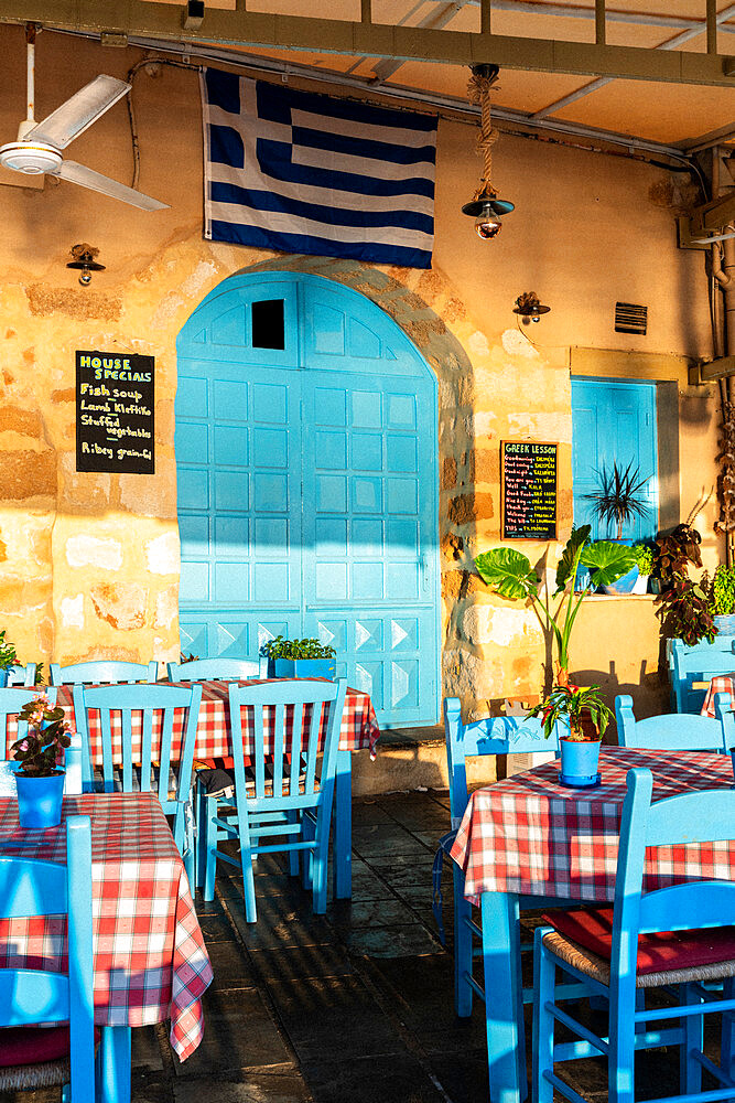 Greek traditional restaurant painted with iconic blue color, Chania, Crete, Greek Islands, Greece, Europe