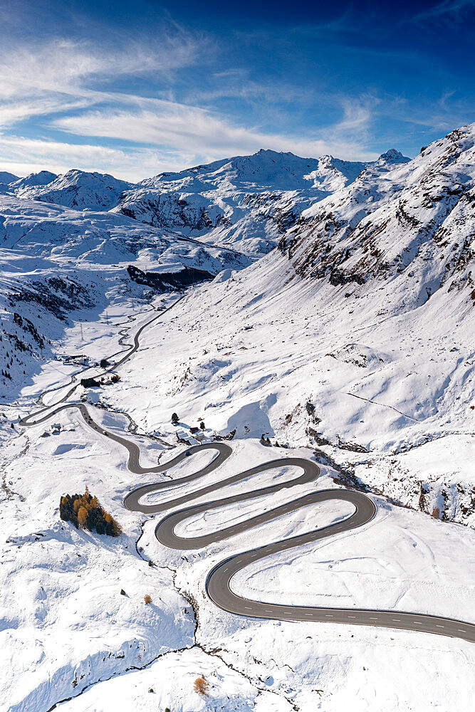 Aerial view of winding mountain road in the snow, Julier Pass, Albula district, Engadine, canton of Graubunden, Switzerland, Europe