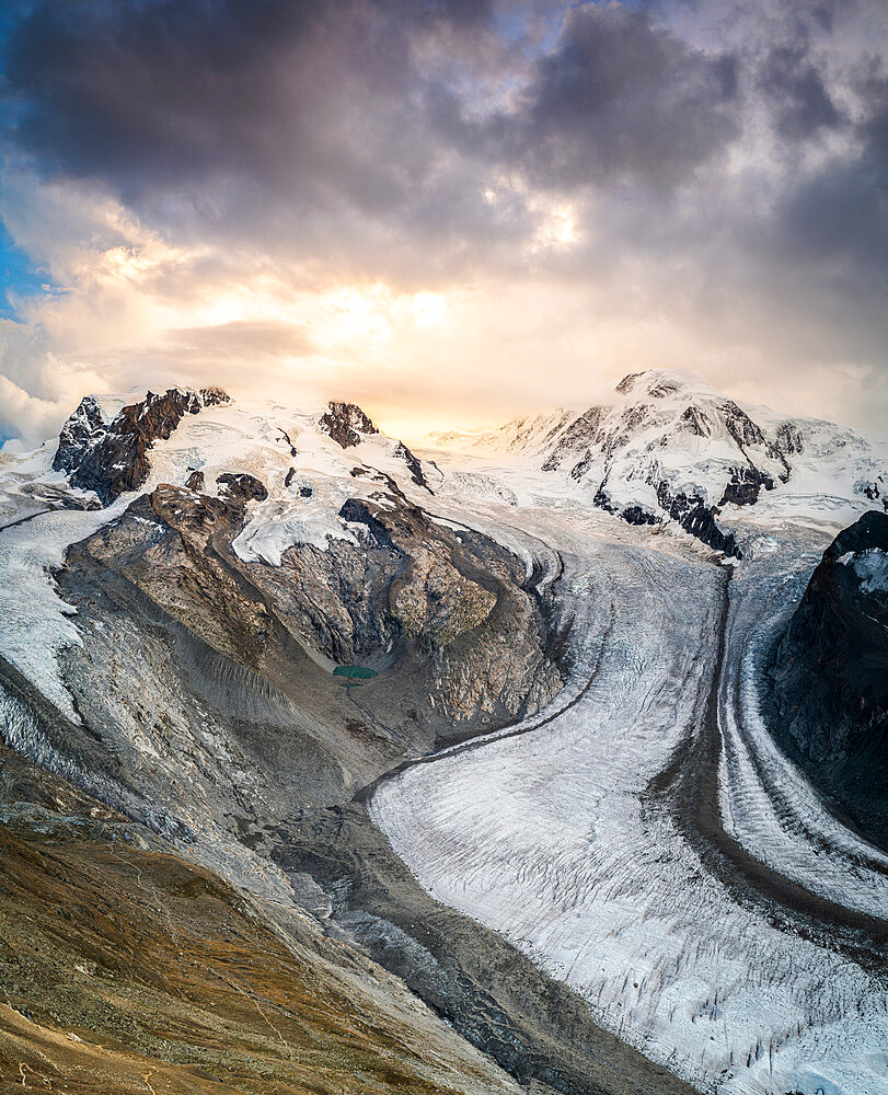 Gorner Glacier (Gornergletscher) with majestic Lyskamm and Monte Rosa peaks at sunset, Zermatt, Valais Canton, Swiss Alps, Switzerland, Europe