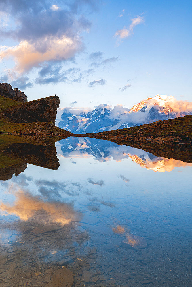 Sunset over Grauseeli Lake with Eiger, Monch and Jungfrau mountains in the background, Murren Birg, Bern canton, Switzerland, Europe