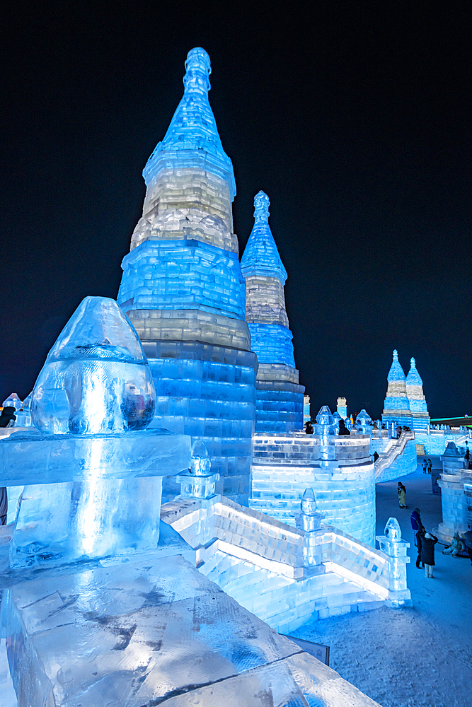 Illuminated buildings made out of ice, Ice International Ice and Snow Sculpture Festival, Harbin, Heilongjiang, China, Asia