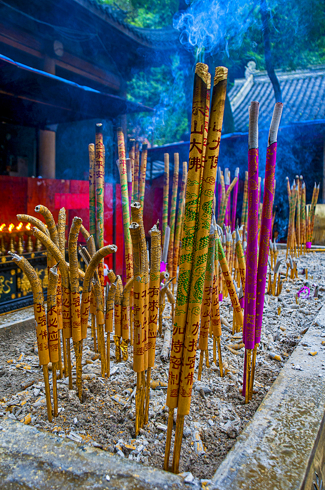 Incense sticks at a monastery on top of the largest Buddha on earth, Leshan, Sichuan, China, Asia