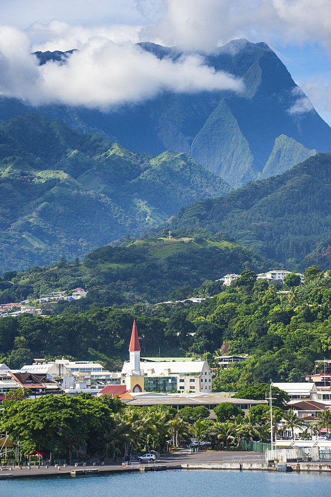 Dramatic mountains looming behind Papeete, Tahiti, Society Islands, French Polynesia, Pacific