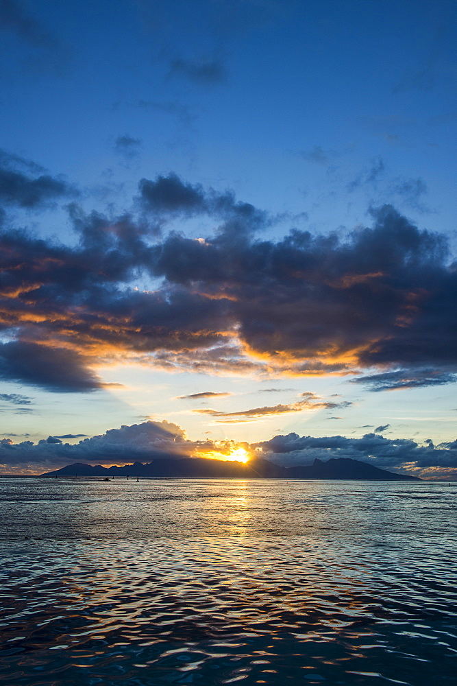 Dramatic sunset over Moorea, Papeete, Tahiti, Society Islands, French Polynesia, Pacific