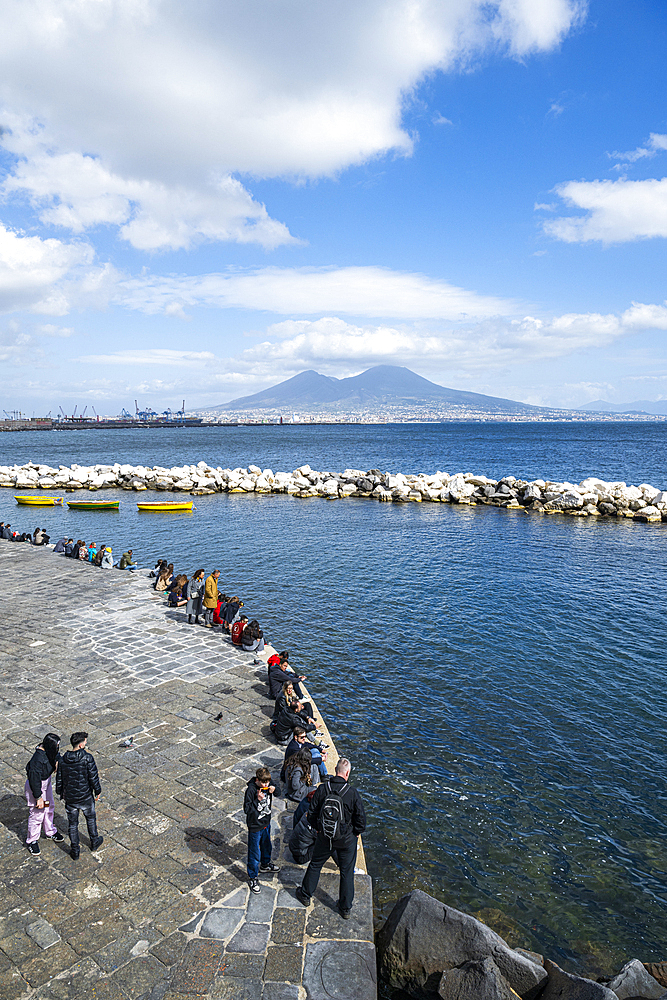 Pier in the the historic Centre of Naples (Napoli), UNESCO World Heritage Site, with Mount Vesuvius in the background, Campania, Italy, Europe