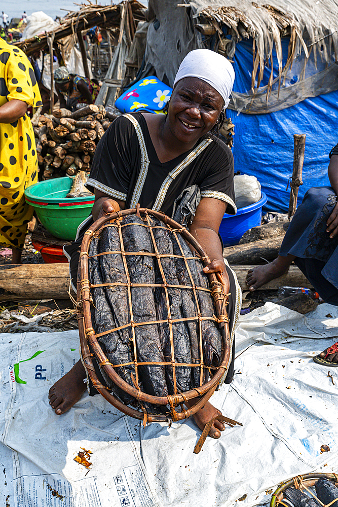 Woman selling fish on a Market, Mbandaka, Equateur province, Democratic Republic of Congo, Africa