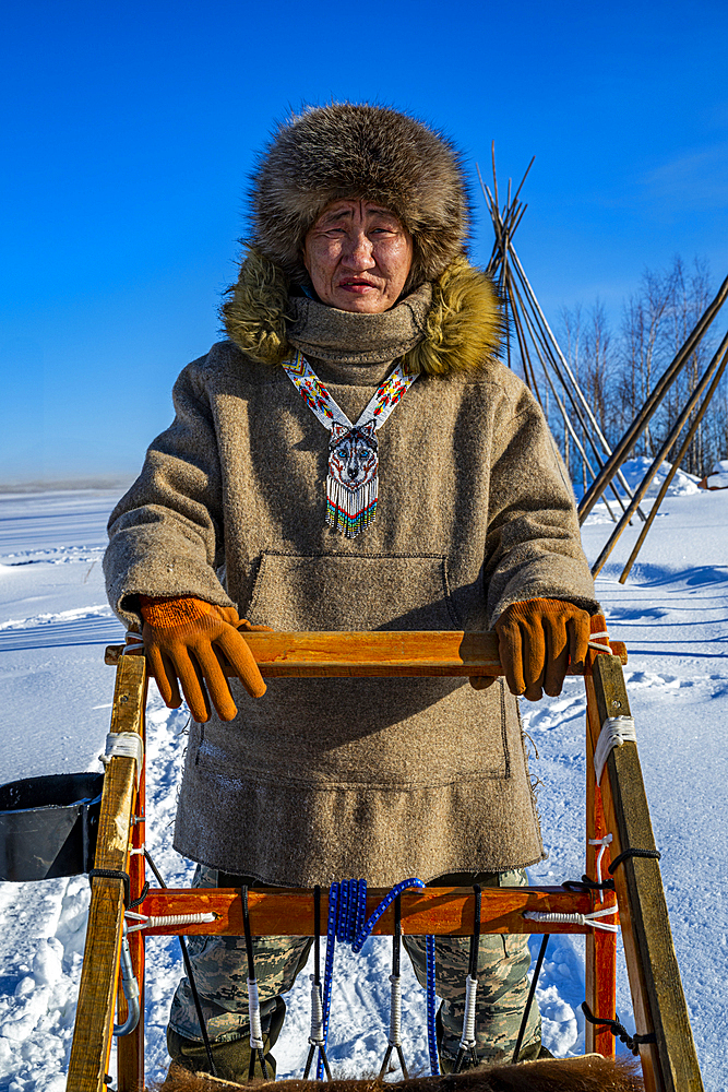 Evenki man on his sledge, Tura, Krasnoyarsk Krai, Evenki state, Russia
