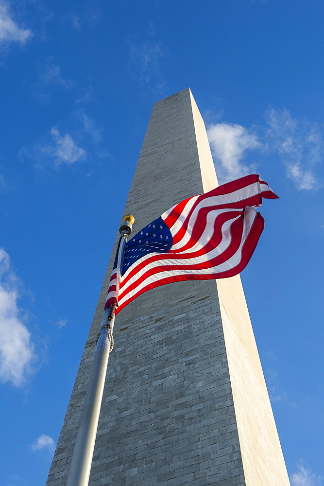 American flag in front of the Obelisk of the Washington Monument at the Mall,  Washington, District of Columbia, United States of America, North America