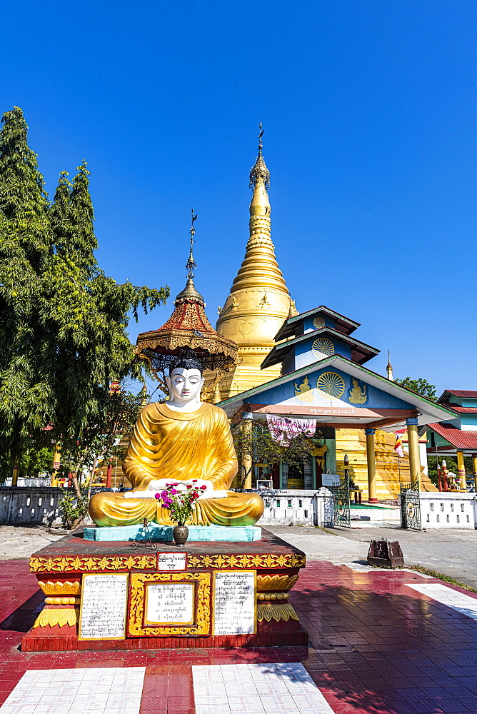 Buddha before the Golden stupa, Aung Zay Yan Aung Pagoda, Myitkyina, Kachin state, Myanmar (Burma), Asia