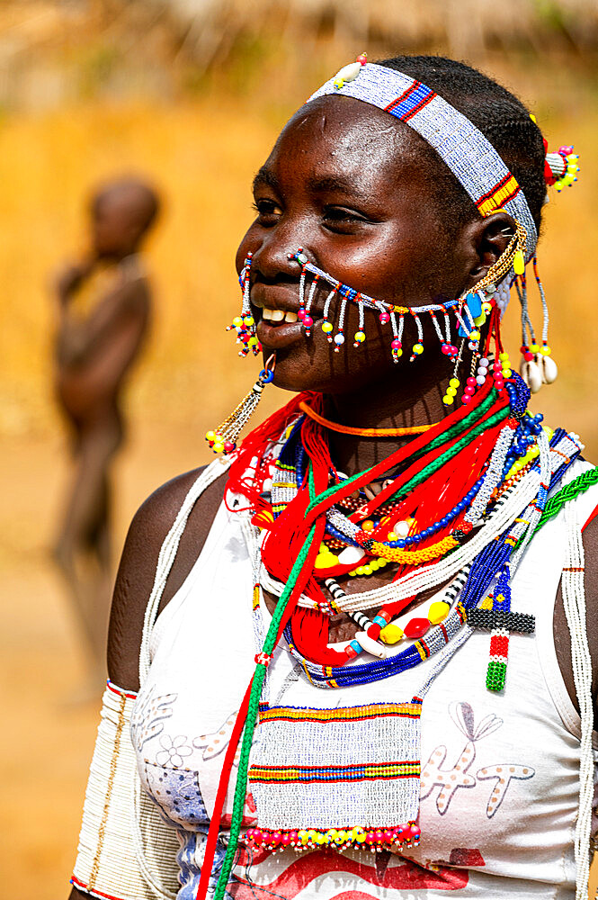 Traditional dressed young girl from the Laarim tribe, Boya Hills, Eastern Equatoria, South Sudan, Africa