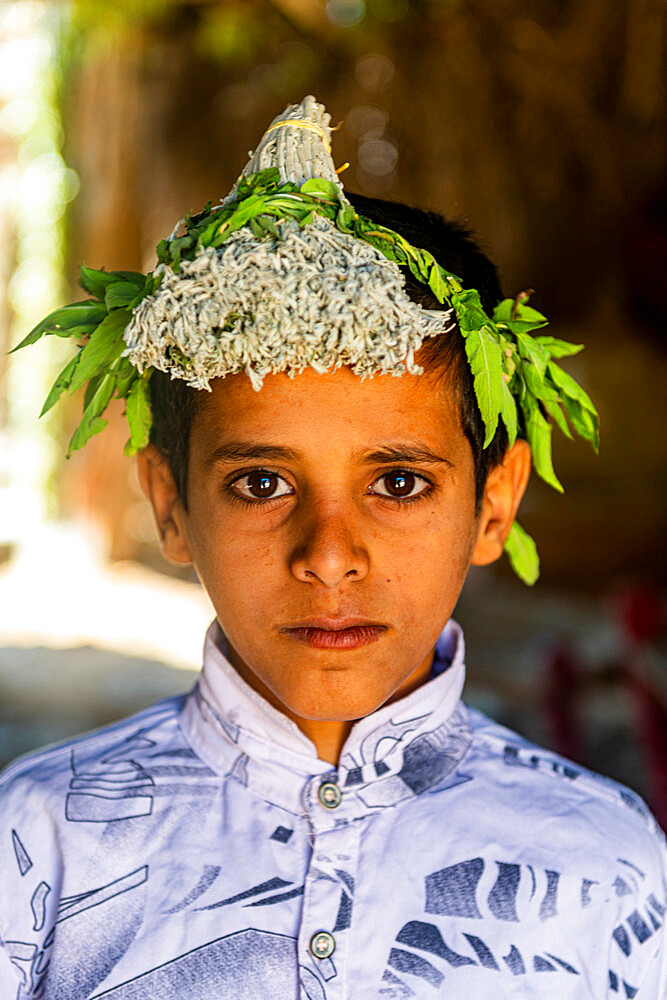 Young boy of the Qahtani Flower men tribe, Asir Mountains, Kingdom of Saudi Arabia, Middle East