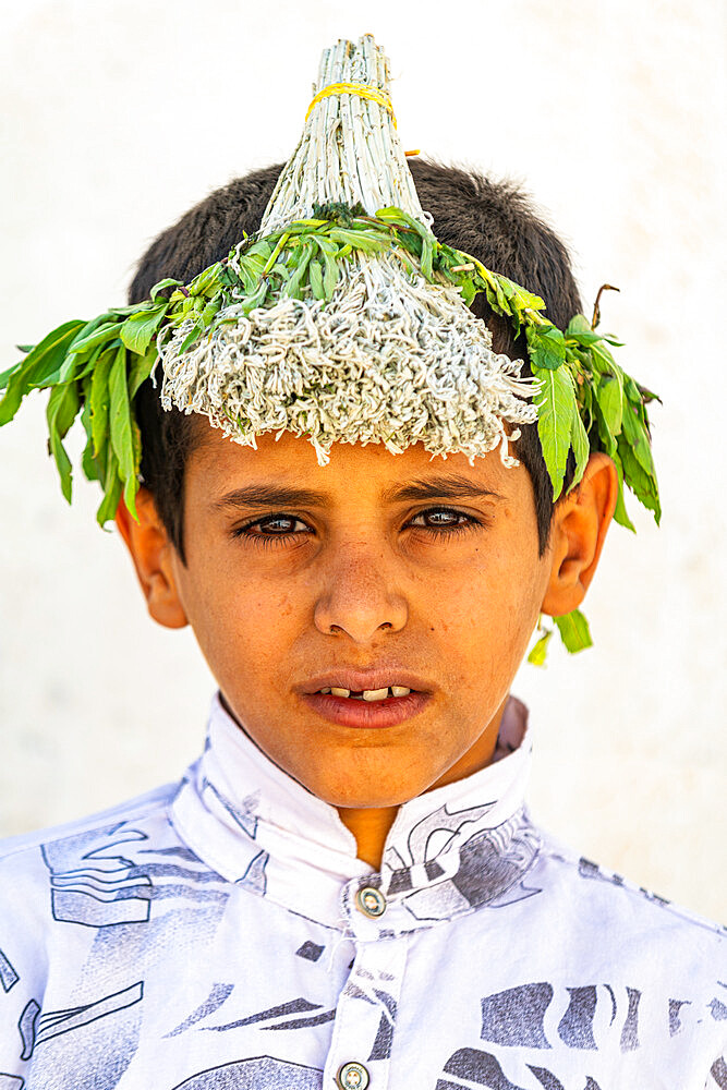 Young boy of the Qahtani Flower men tribe, Asir Mountains, Kingdom of Saudi Arabia, Middle East