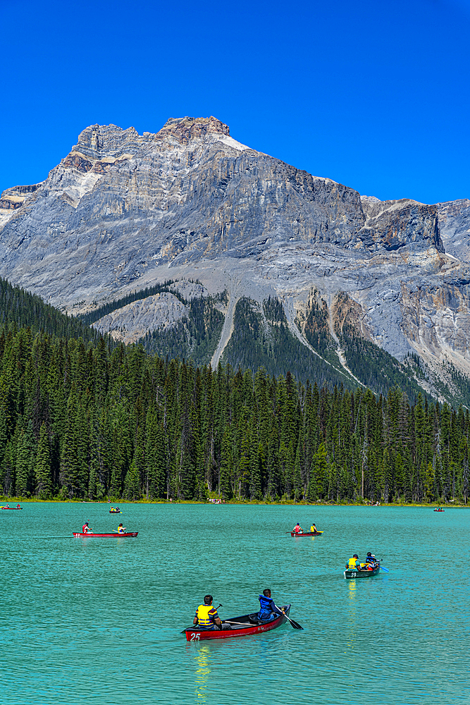 Tourists in canoes, Emerald Lake, Yoho National Park, UNESCO World Heritage Site, British Columbia, Canada, North America