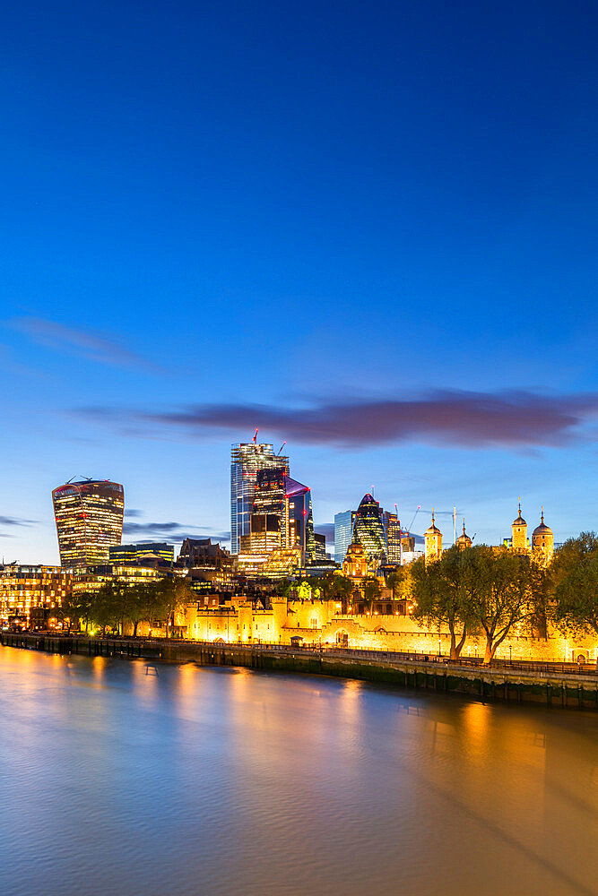 The City of London and The Tower of London at dusk and the River Thames, London, England, United Kingdom, Europe