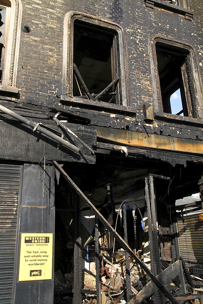 Damage to property after riots and looting in Croydon, London, UK ;