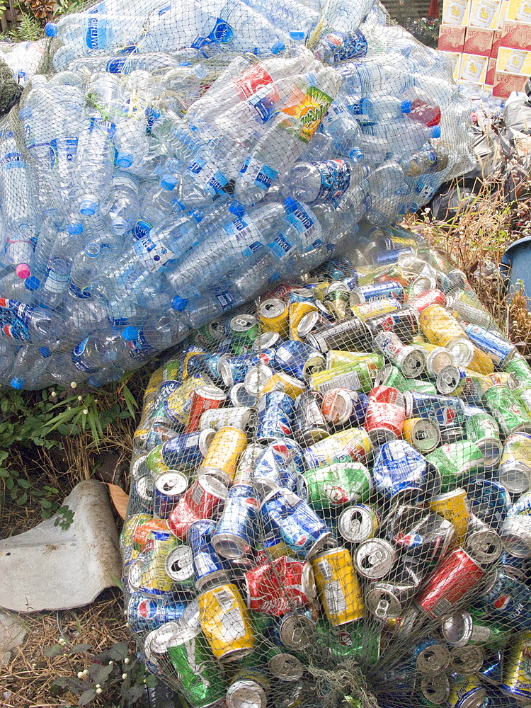 Thailand, recycling bottles and cans at a tourist resort on the island of ko chang