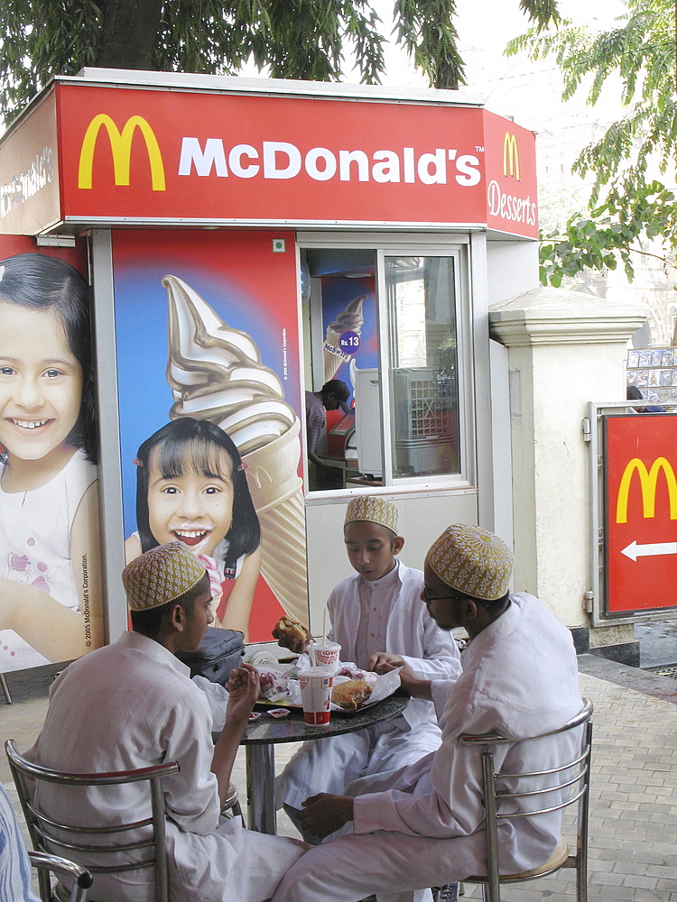 India. Muslim youth at a mcdonalds in mumbai. Photo julio etchart