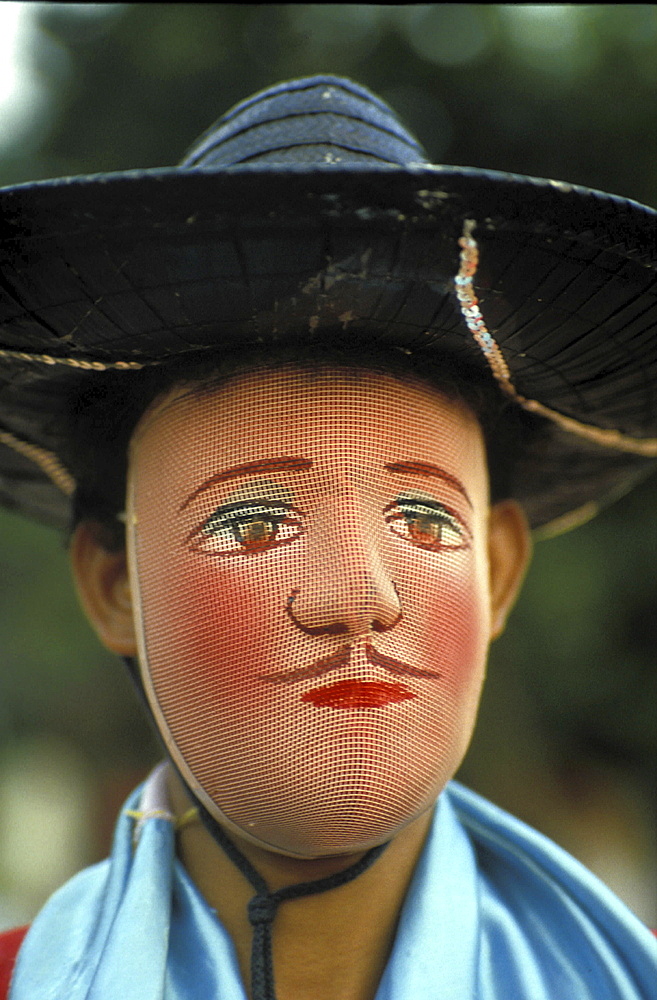 Traditional mask, nicaragua. Monimbo. A dancer wearing a traditional mask over their face