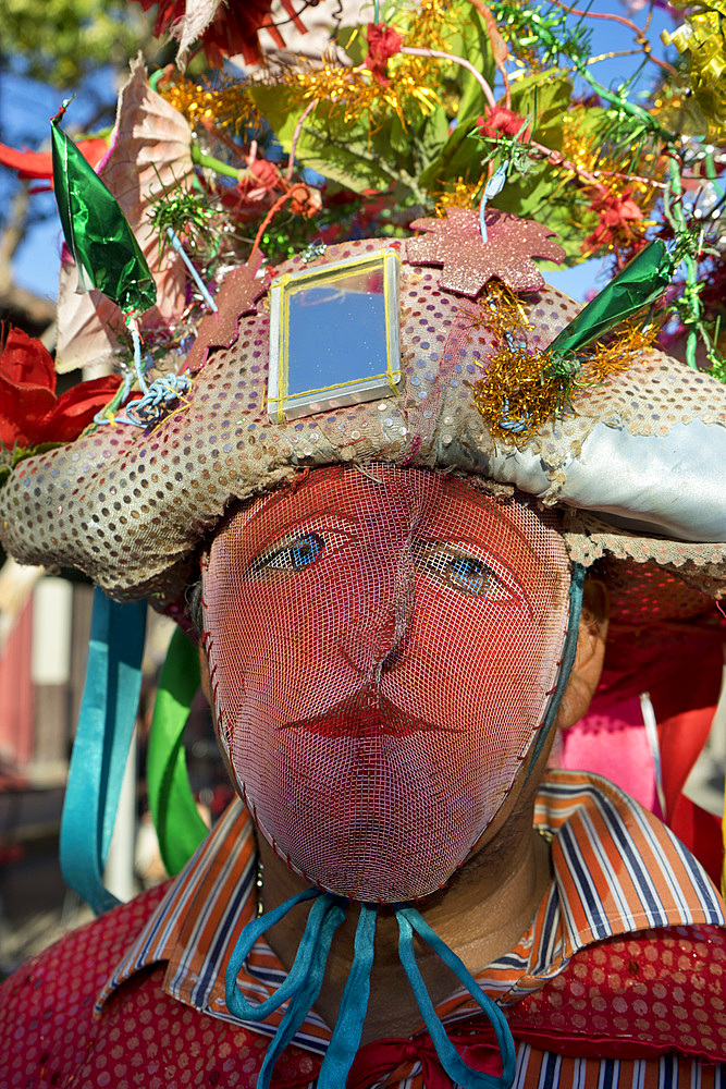 Masked reveller at carnival parade in Granada, Nicaragua, Central America