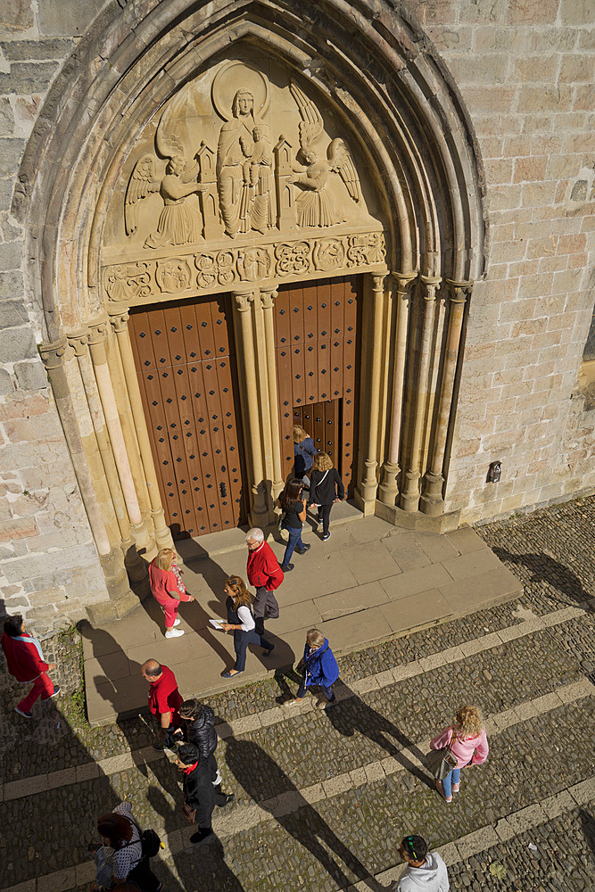 Christian pilgrims on the Camino de Santiago (St. James' Way) route in Roncesvalles, Navarre,Spain, Europe