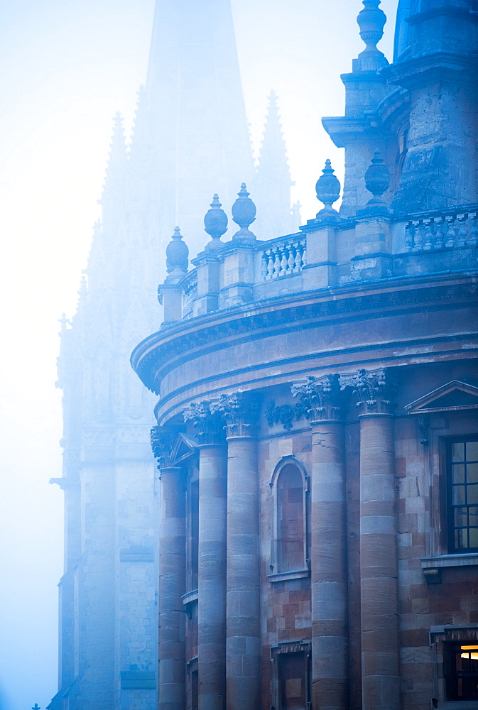 Radcliffe Camera and St. Mary's Church in the mist, Oxford, Oxfordshire, England, United Kingdom, Europe