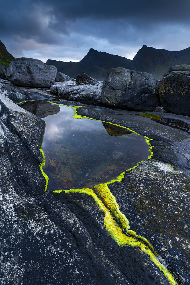 Rock formations and reflection, Tungeneset, Senja, Norway, Scandinavia, Europe