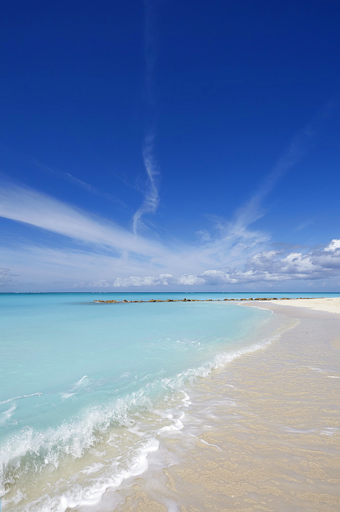 The sands of Grace Bay, the most spectacular beach on Providenciales, Turks and Caicos, in the Caribbean, West Indies, Central America