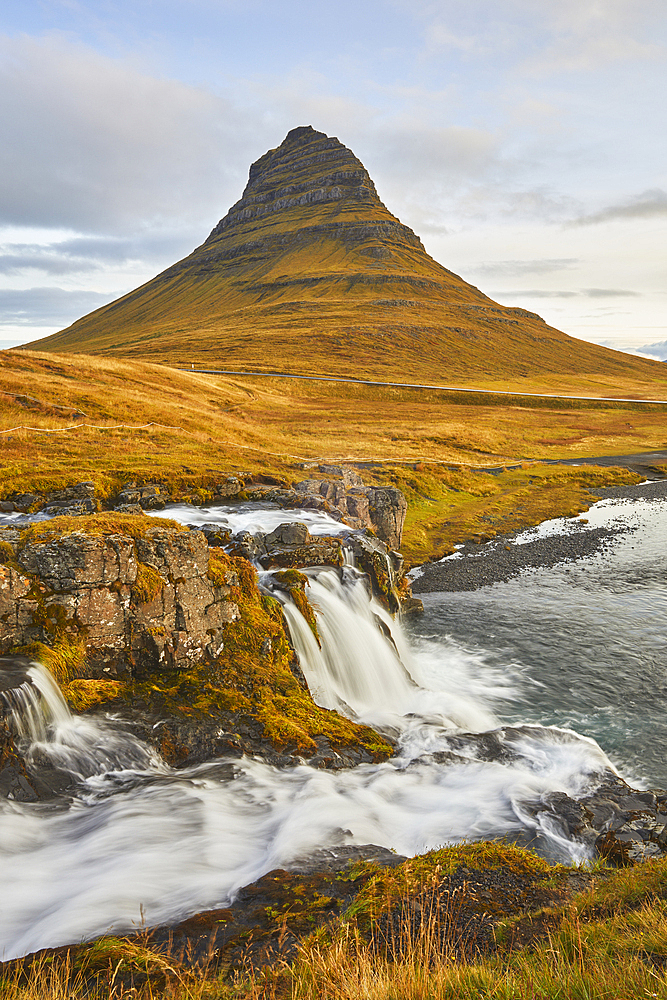 Mount Kirkjufell and Kirkjufellsfoss Falls, near the port of Grundarfjordur, Snaefellsnes peninsula, western Iceland, Polar Regions